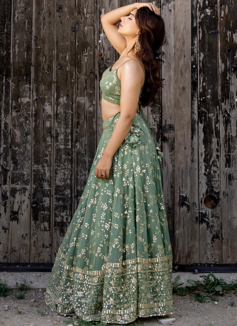 Green Color Indian Wedding Designer lehenga choli for Women with sequence embroidery work.