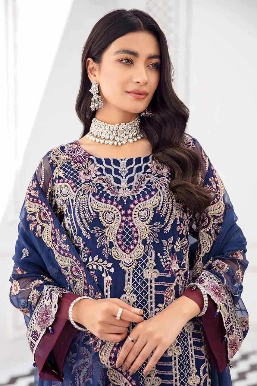 Women's Blue Faux Georgette Semi Stitched Top With Santoon Unstitched Bottom and Nazmin Dupatta Embroidery work Dress Material